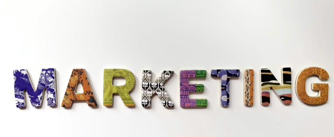 Colorful letters spelling 'MARKETING' on a white background.