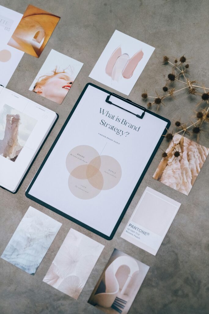 Flat lay of brand strategy materials with visual brand elements, KPIs, and design samples used to measure brand recognition success