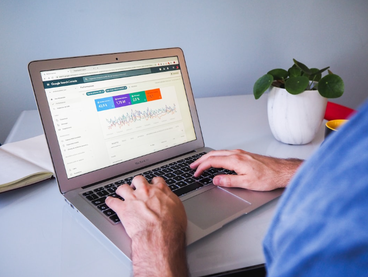 Marketer analyzing Google Search Console data to improve SEO and implement effective link building strategies through high-value content