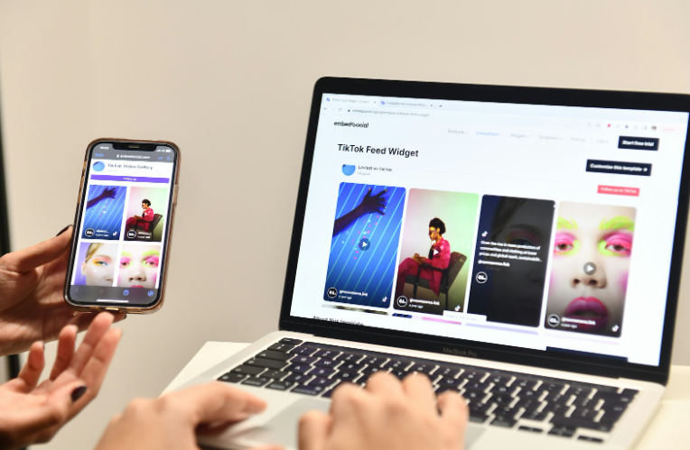 User-generated content displayed on phone and laptop for social media marketing