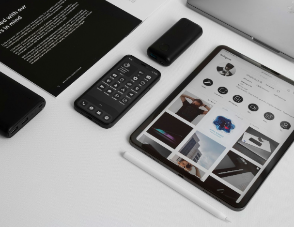 Mobile devices and tablet displaying a website layout, representing mobile optimization and responsive design